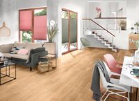 Wohnraum mit rosa Akzenten und massivem Holzboden, Osmo